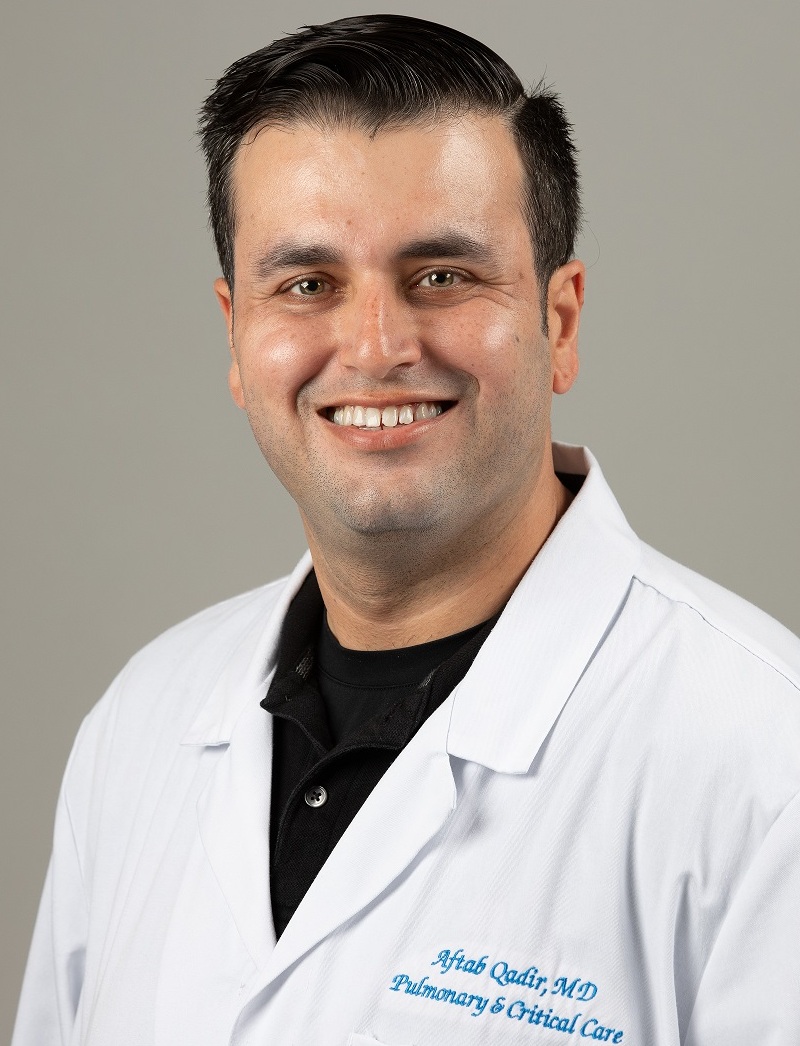 Professional headshot of Dr. Aftab Qadir, MD, specializing in Pulmonary and Critical Care